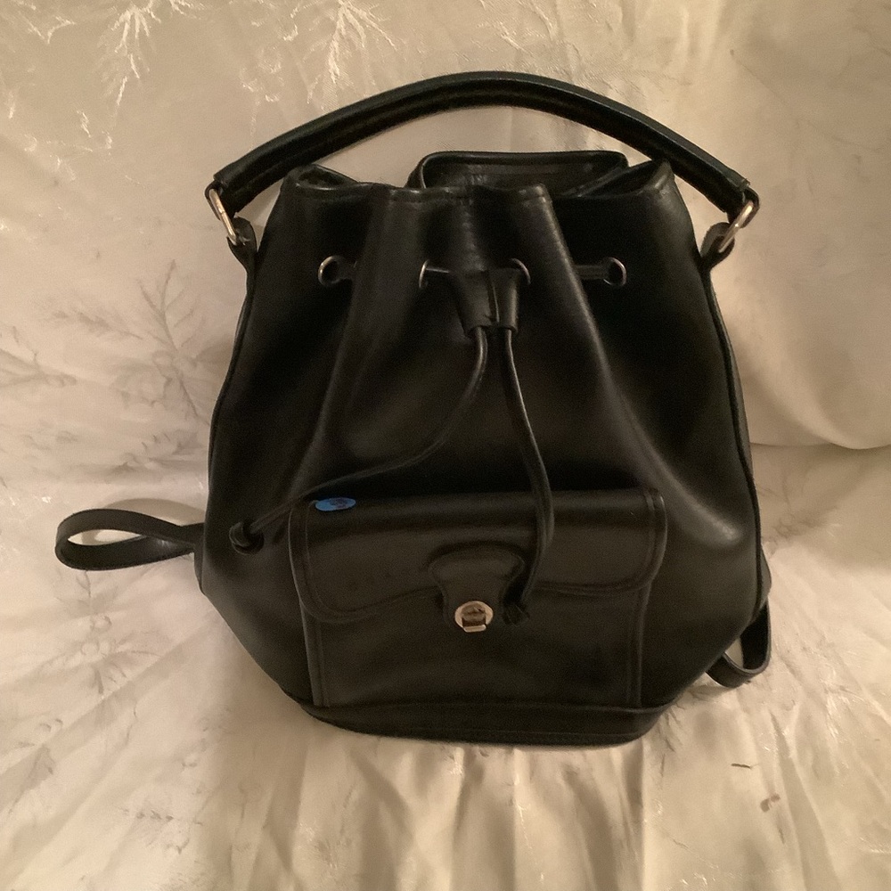 New backpack  interior and exterior pockets.  13” x 12”.